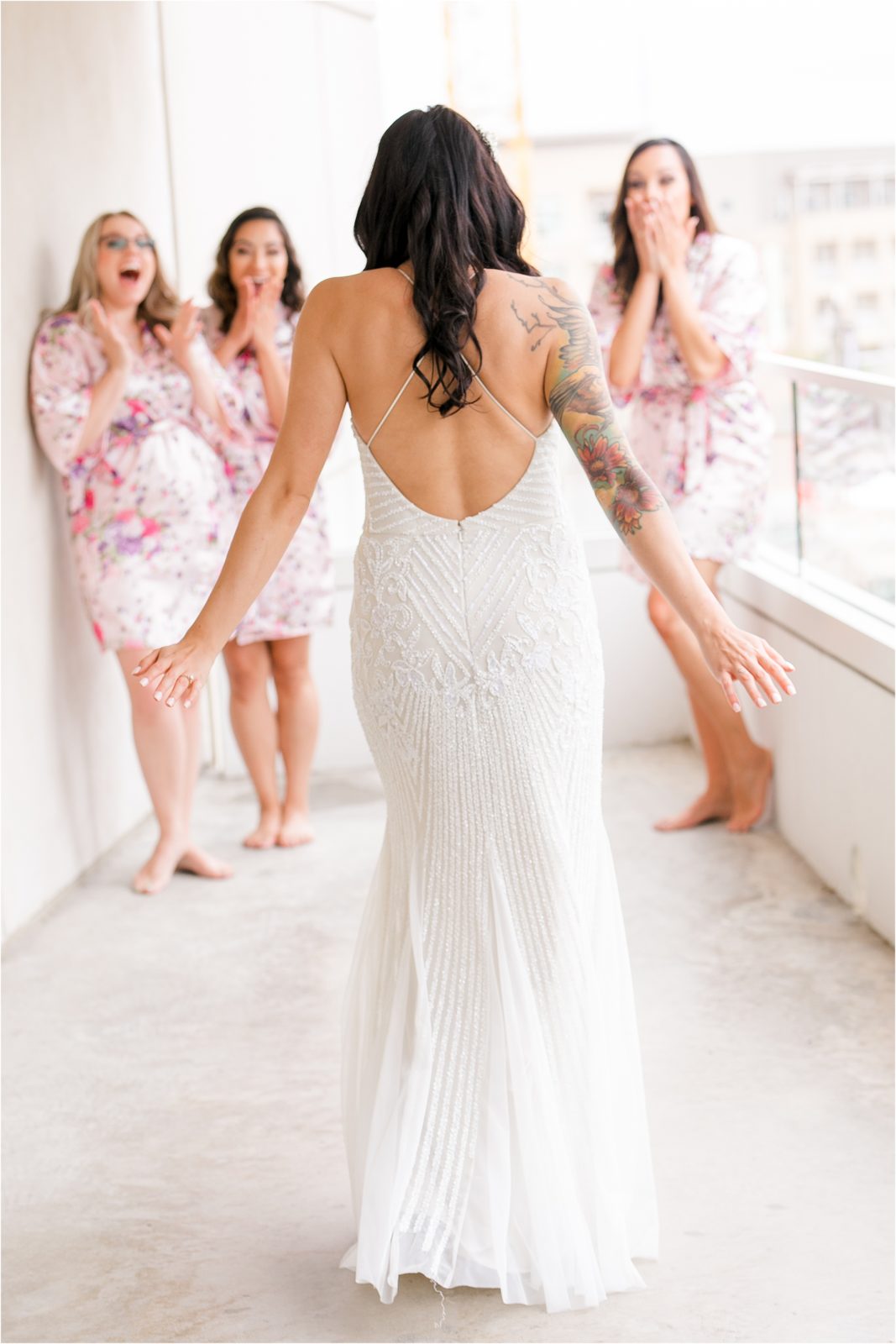 Reveal with bridesmaids by Dallas Wedding Photographer Jillian Hogan Photography 