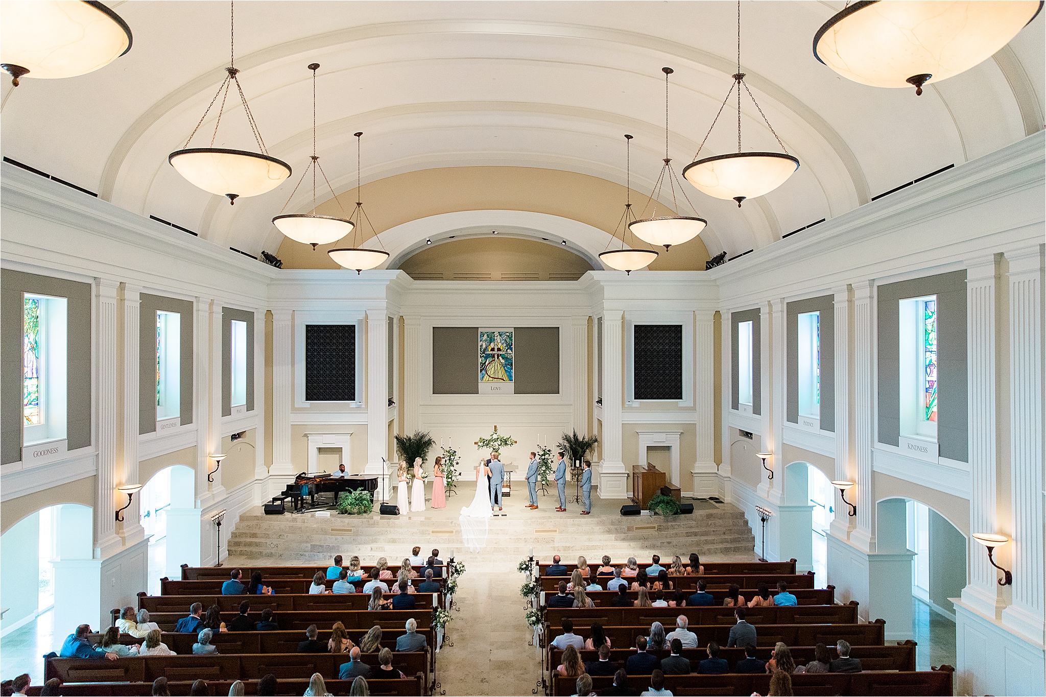 A wide view of a wedding ceremony at Prestonwood Chapel in Plano, Texas