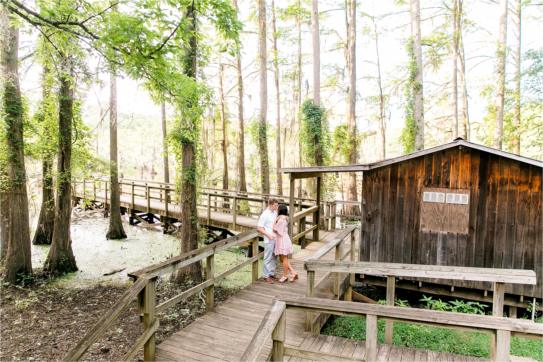 A couple kissing on the docks at Caddo Lake State Park in East Texas 