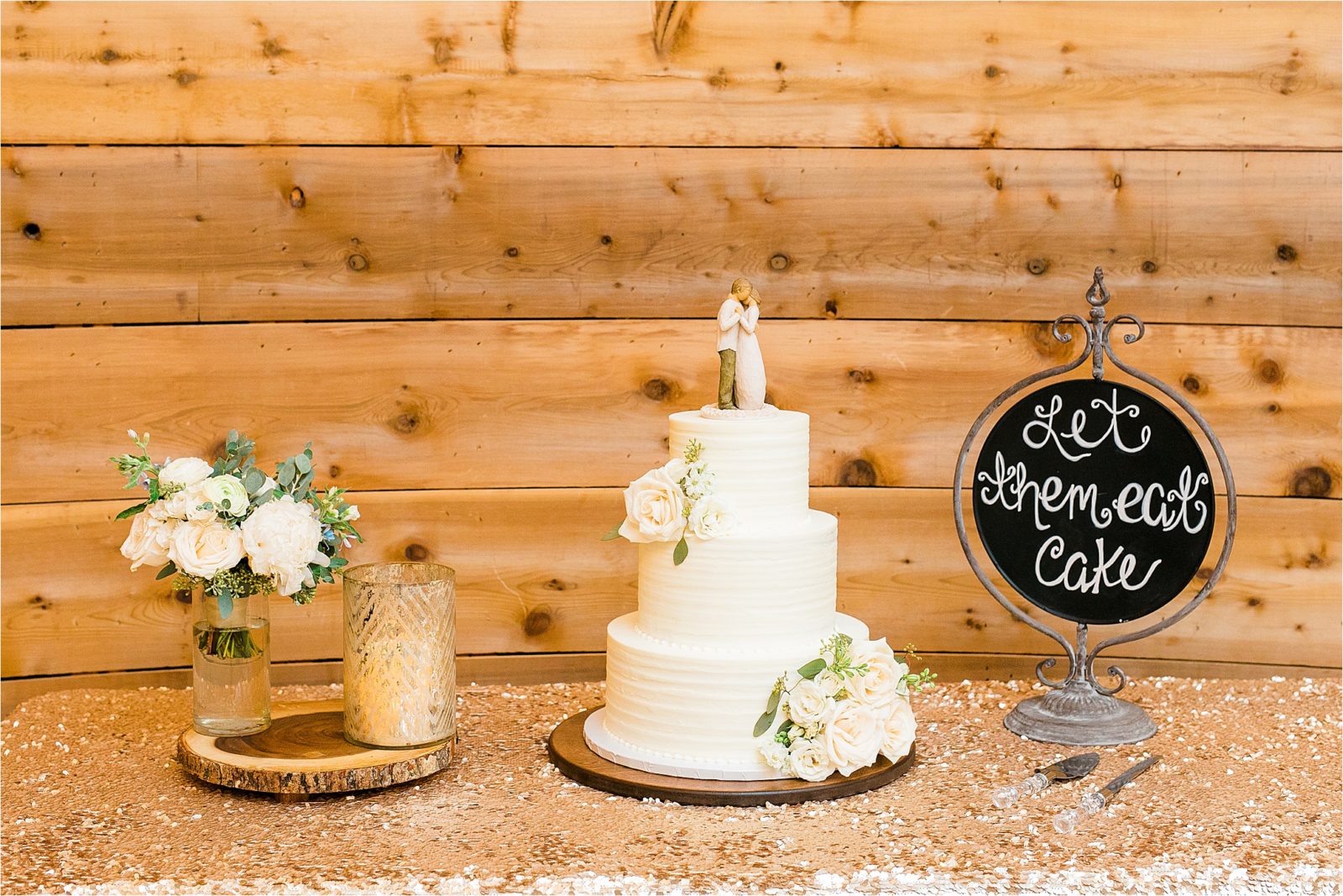 Let's eat cake sign and a traditional wedding cake by Baker Mama at Rustic Grace Estate in Van Alstyne, Texas 