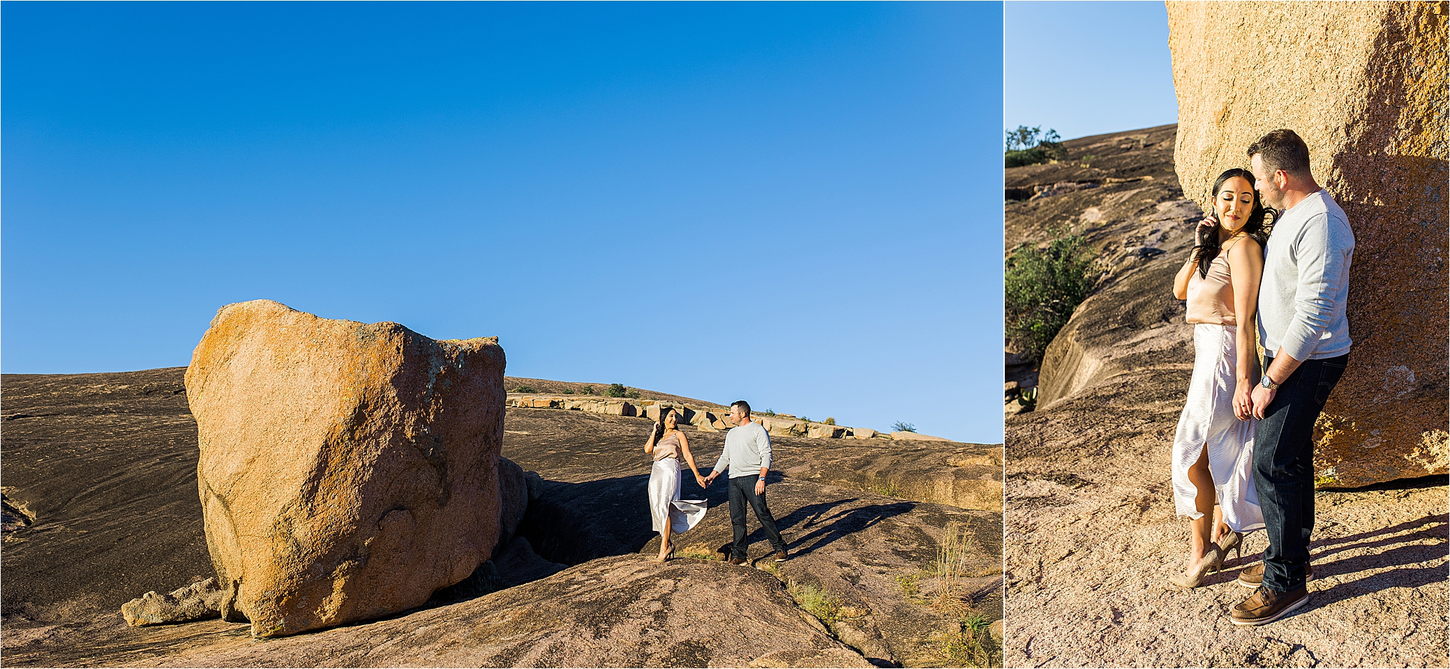 A couple walks in the sunshine holding hands in front of a large boulder at Enchanted Rock State Park in the Texas Hill Country 