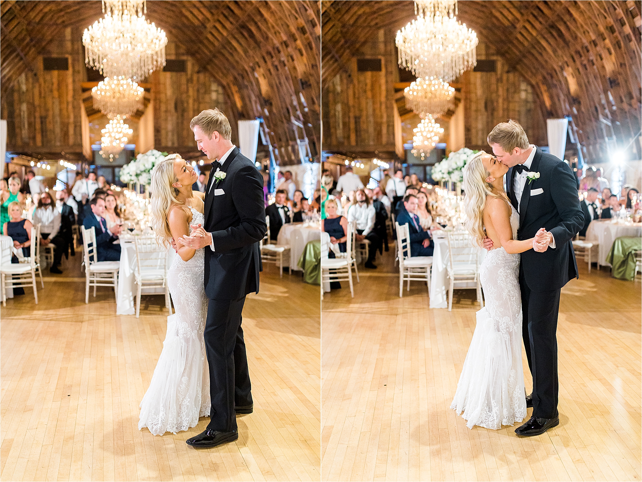 A bride and groom share their first dance and kiss in their brown barn style wedding as their guests look on. 