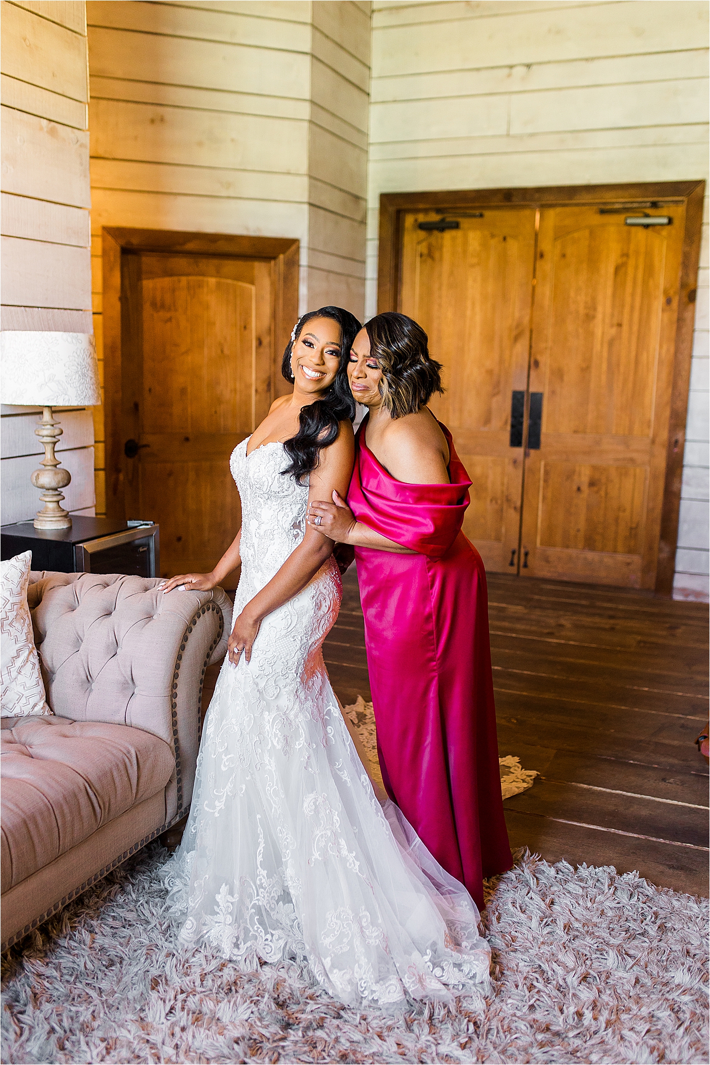 A bride's mom cries and hugs the bride inside Morgan Creek bridal suite on her wedding day by San Antonio Wedding Photographer Jillian Hogan Photography 