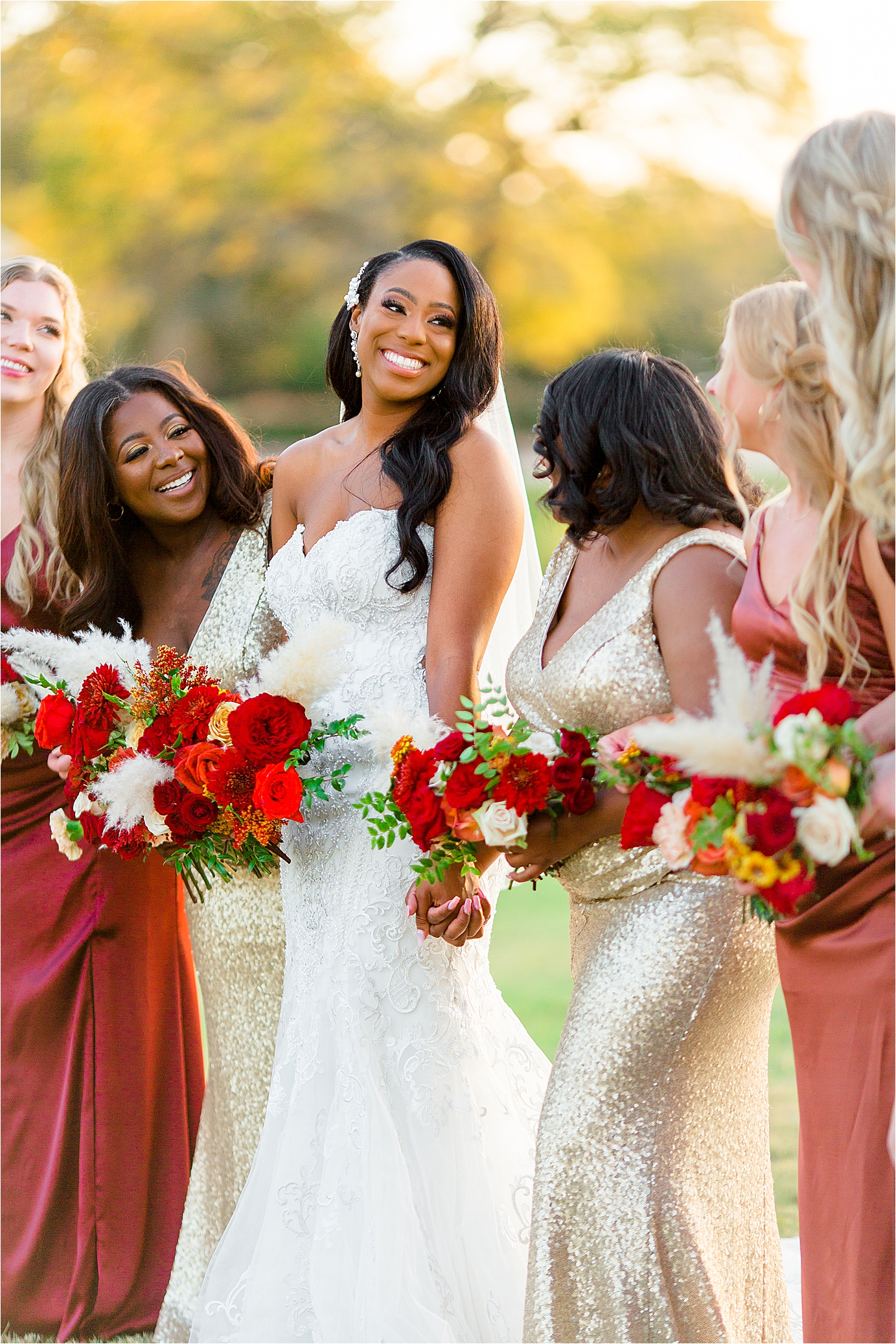 A bride smiles at her bridesmaids at The Milestone by Boerne Wedding Photographer Jillian Hogan 
