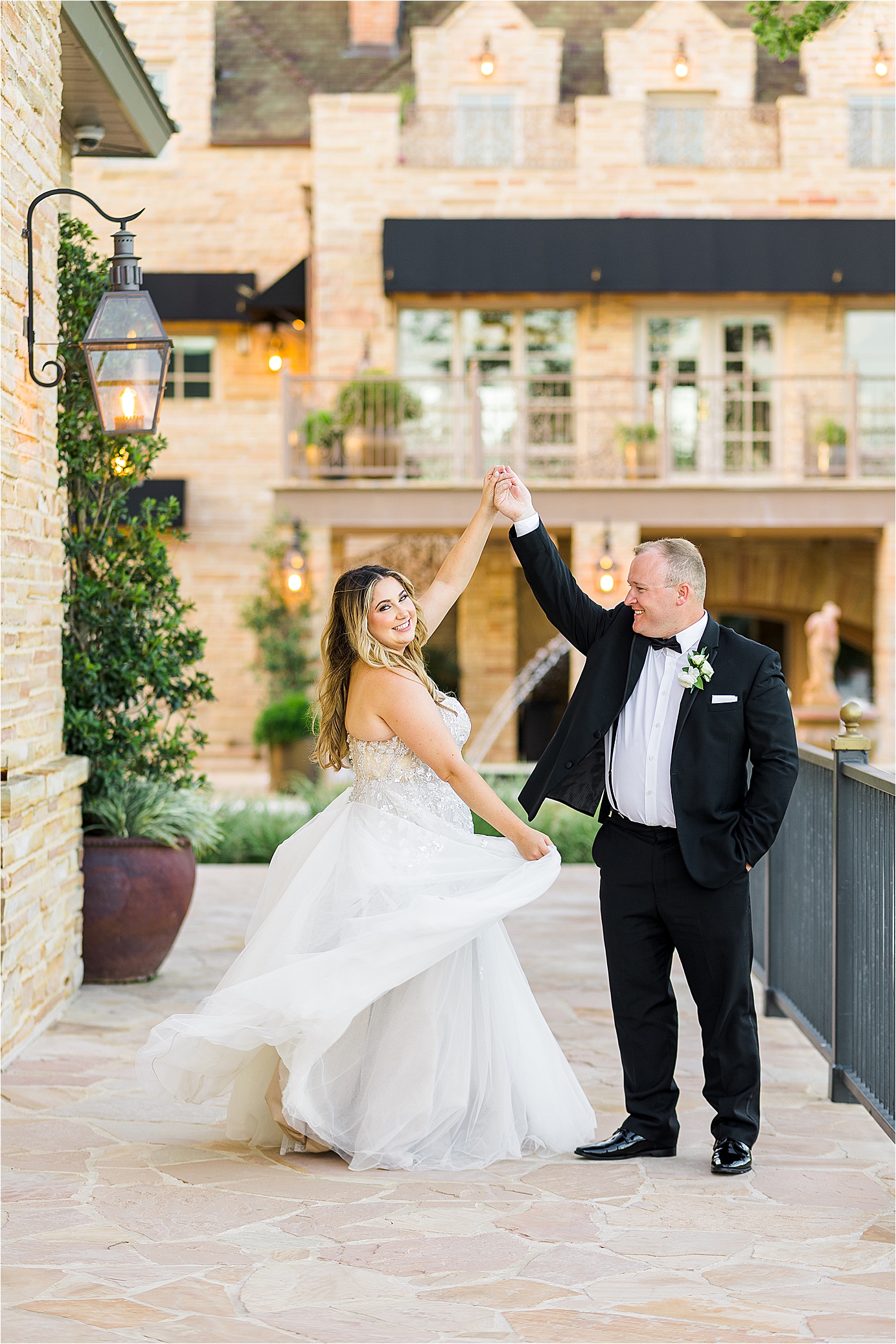 A newlywed couple share a dance outside at The Redberry Estate during their wedding day portraits with San Antonio Wedding Photographer Jillian Hogan 